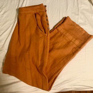 Free People Orange Pants with Brown Buttons